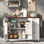 Îlot de cuisine roulant de style ferme de 138,4 cm avec prise électrique, étagère de rangement, rabat et porte-épices